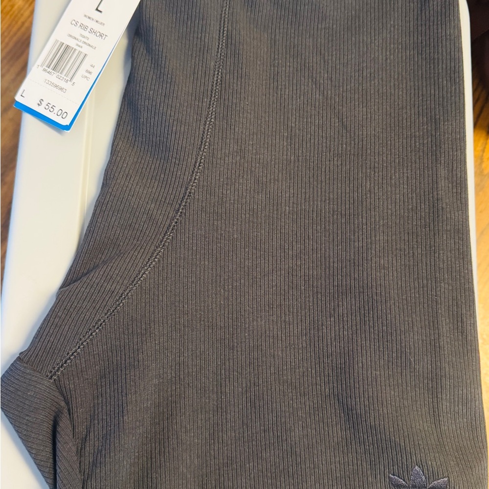 adidas Black Bike Shorts. They look light in the pictures but they are Black.